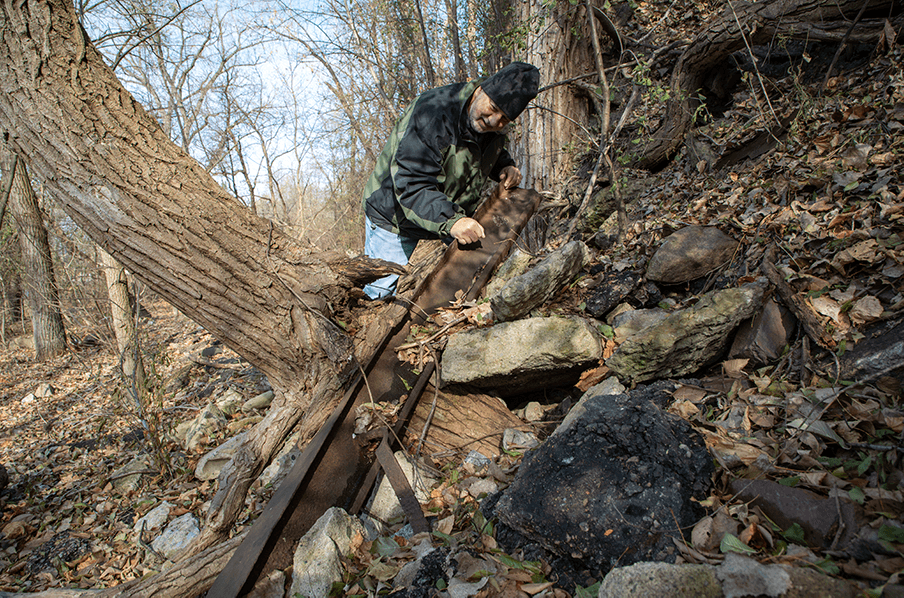 Person with debris and tree