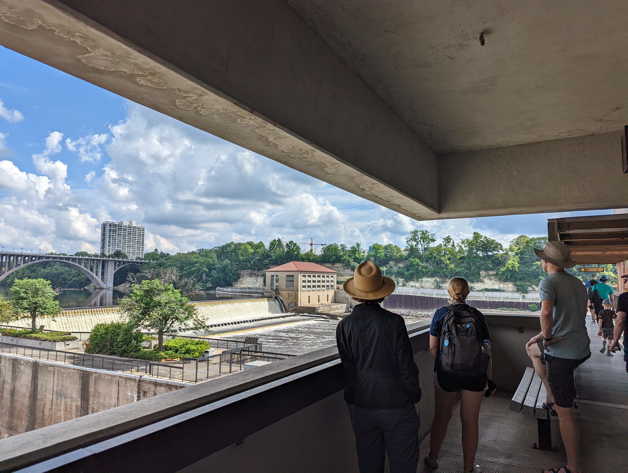 People look out at Ford Dam