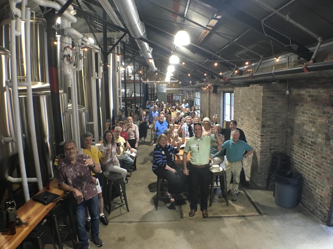 River Guardians Happy Hour attendees toasting the 2017 legislative session