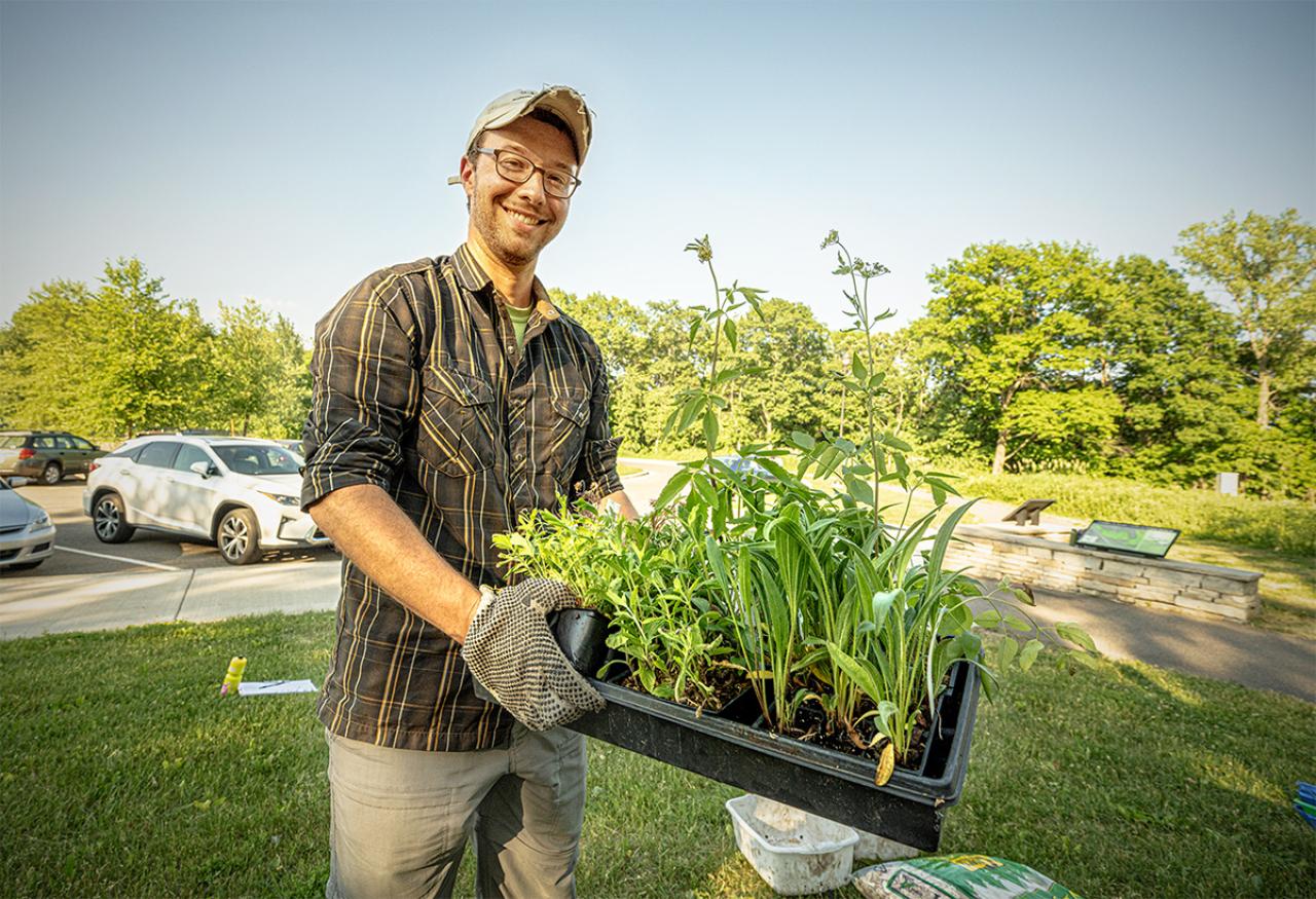 Alex Roth with plants