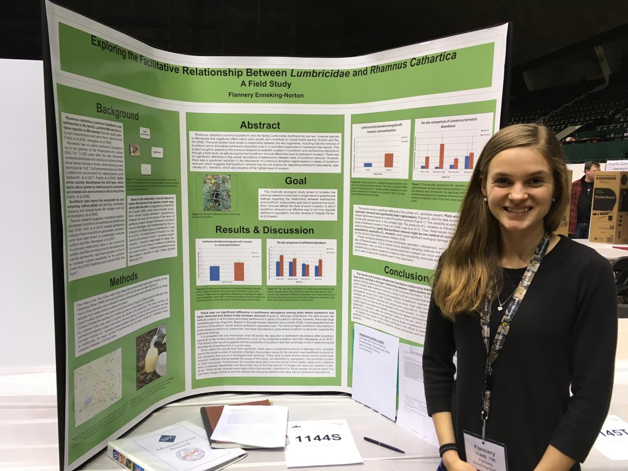 Flannery Enneking-Norton stands with her award-winning project at this month's Twin Cities Regional Science Fair. 