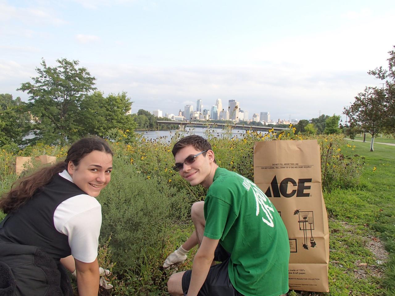 Two volunteers tending the prairie at Ole Olson Park in north Minneapolis