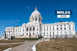 The Minnesota Capitol building in St. Paul, with a blue sky and a smattering of snow on the ground. Small text says "MNLEG 2025"