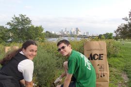 Two volunteers tending the prairie at Ole Olson Park in north Minneapolis