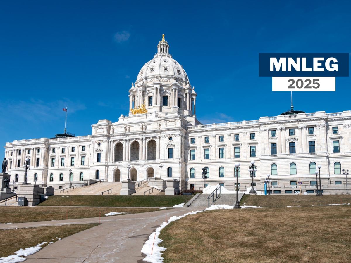 The Minnesota Capitol building in St. Paul, with a blue sky and a smattering of snow on the ground. Small text says "MNLEG 2025"